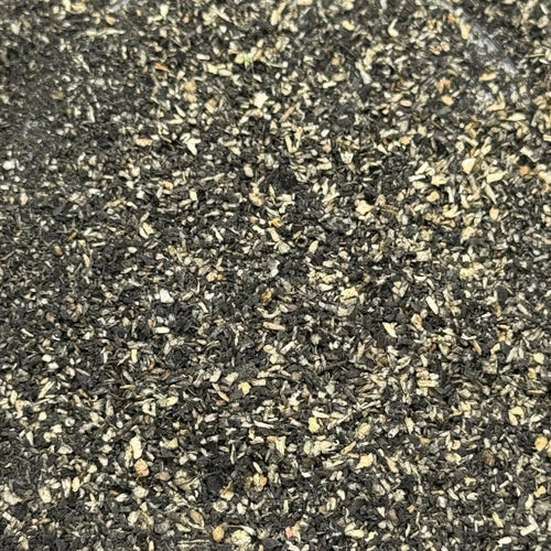 Close-up of dark grey and tan coarse texture for wargaming terrain basing