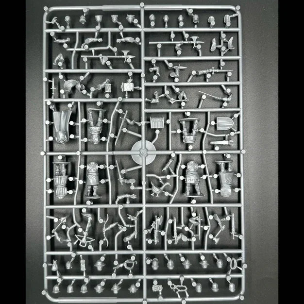 Wargaming miniatures sprue with detailed figures and accessories for hobby assembly