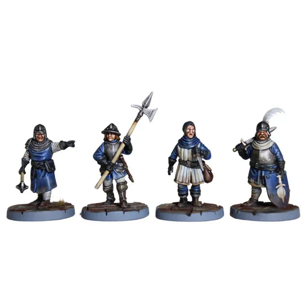 Four detailed wargaming miniatures in medieval armor with weapons and torches