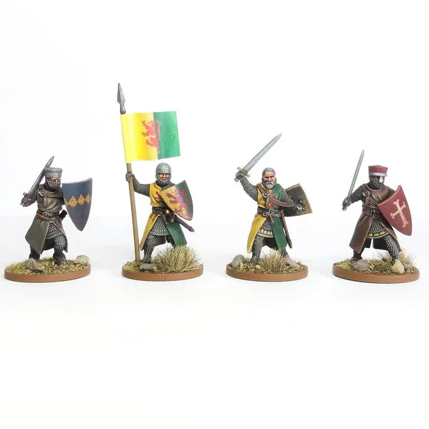 Four medieval knight miniatures in chainmail with swords, shields, and heraldic banners for wargaming