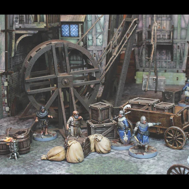 Painted medieval wargaming miniatures with spears, axes, and scrolls for tabletop battles