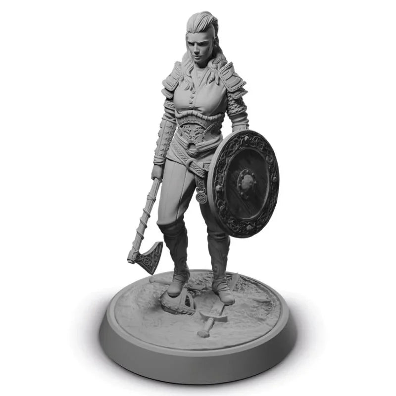 Unpainted female warrior miniature with axe and shield, ideal for wargaming and hobby painting
